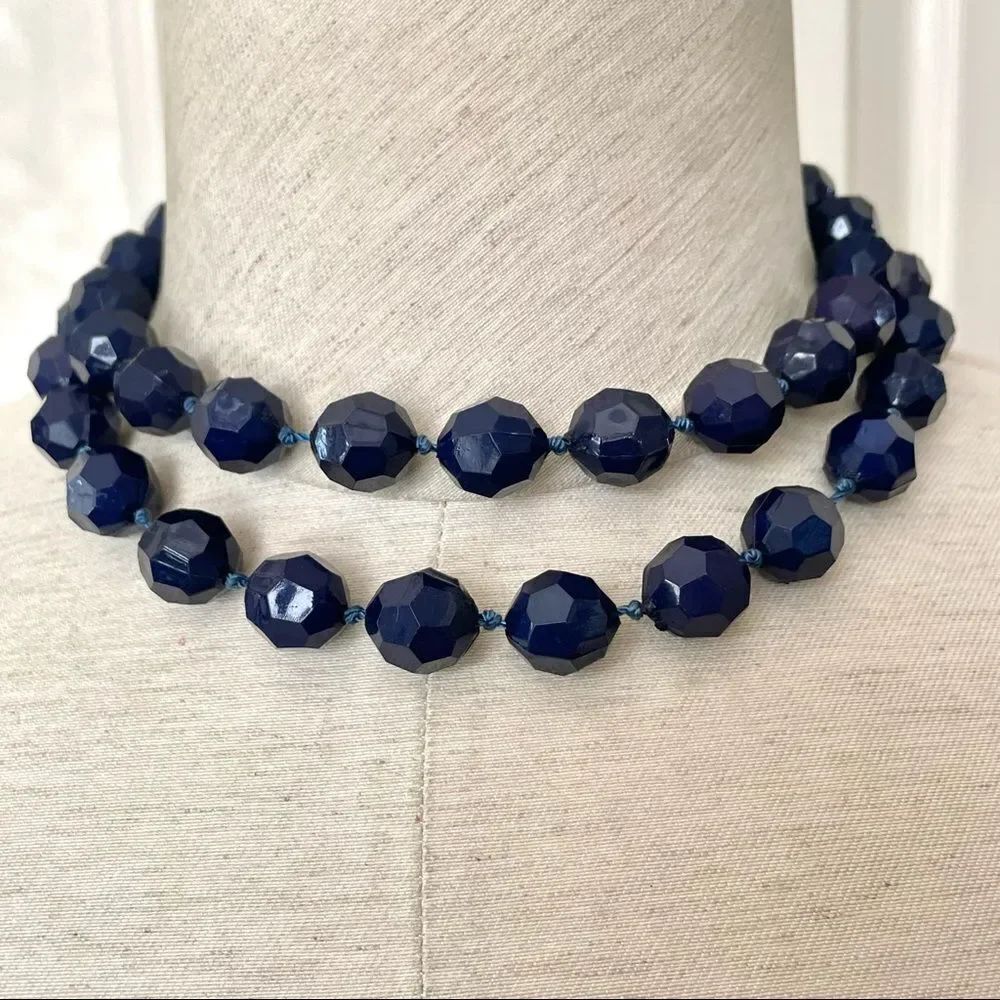 Long dark blue beaded necklace
